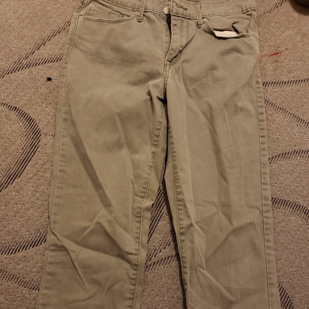 Mid-rise green skinny jeans